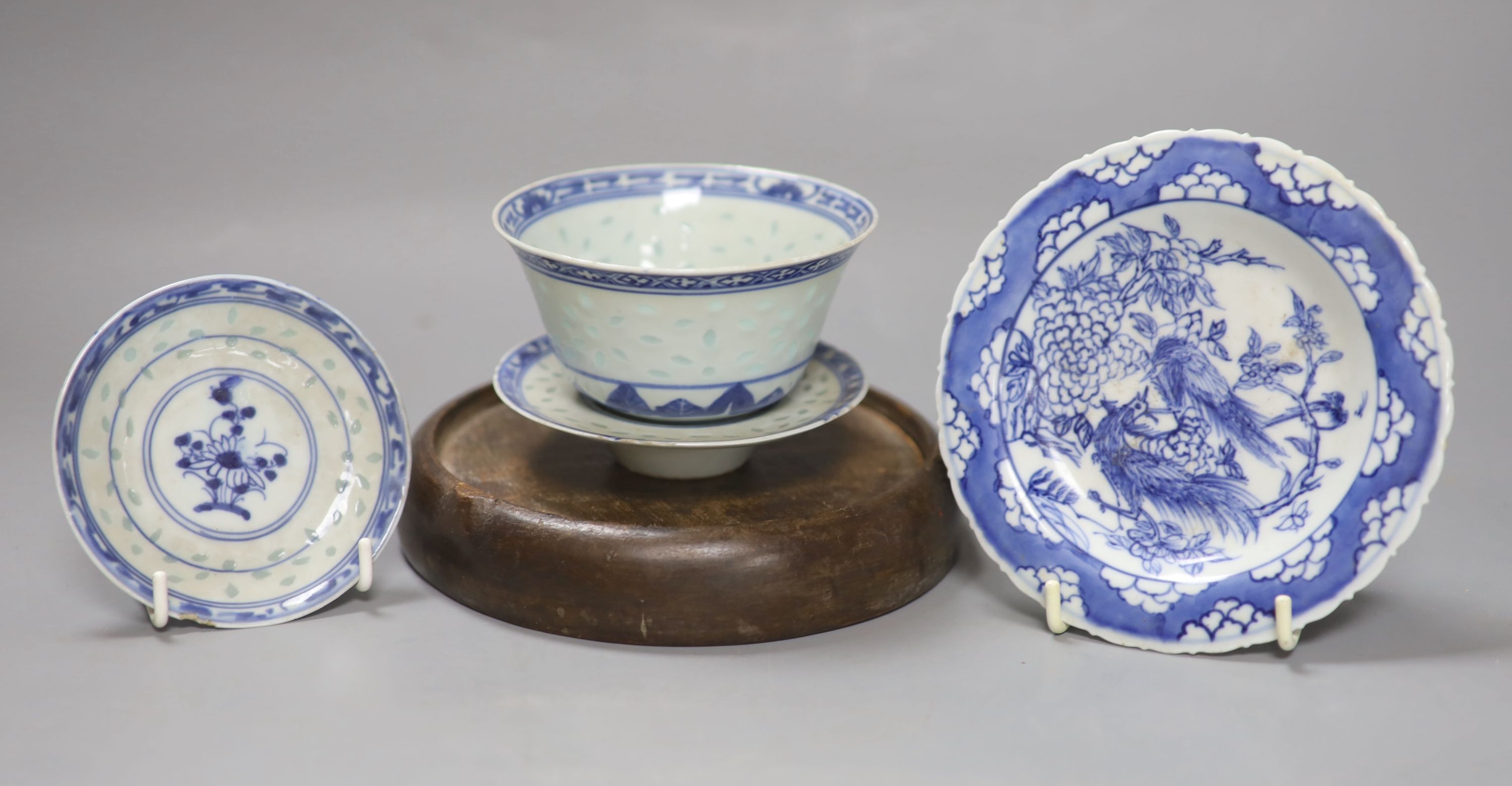 A group of Chinese blue and white wares, including a Chinese blue and white dish, a similar pedestal dish and a tea bowl and saucer, to